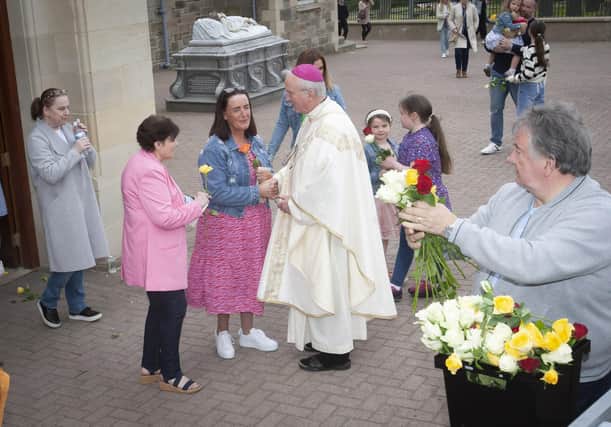 Bishop Dónal McKeown in conversation with some of those who attended Sunday’s Mass at the Sister Clare Crockett Retreat in the Long Tower Church. (Photos: Jim McCafferty Photography)