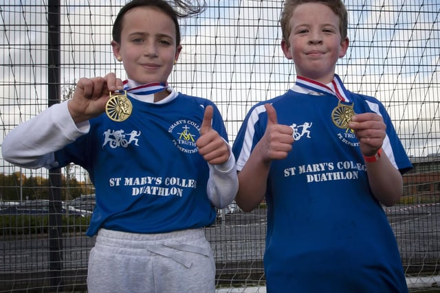 Greenhaw PS pupils Amy Rose and Isaac pictured with their medals.