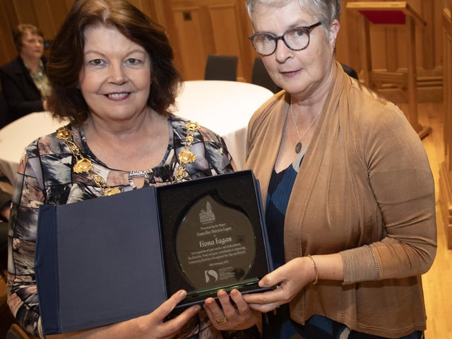 The Mayor, Patricia Logue makes a presentation to Fiona Fegan, chief executive of the Churches Trust at Thursday night's reception in the Guildhall to mark her retirement and her contribution to improving community relations throughout the city and district. (Photos: Jim McCafferty Photography)