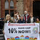 Concerned Residents Around Magee (CRAM) gather in Guildhall Square on Wednesday afternoon calling for a 10% cap on homes of multiple occupancy (HMO) prior to attending the DCSDC Planning meeting.  Photo: George Sweeney