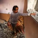 A girl reacts standing in a house destroyed by Israeli bombardment in Rafah refugee camp, south of the Gaza Strip, on January 1, 2024, amid the ongoing conflict between Israel and the Palestinian militant group Hamas. (Photo by AFP) (Photo by -/AFP via Getty Images)