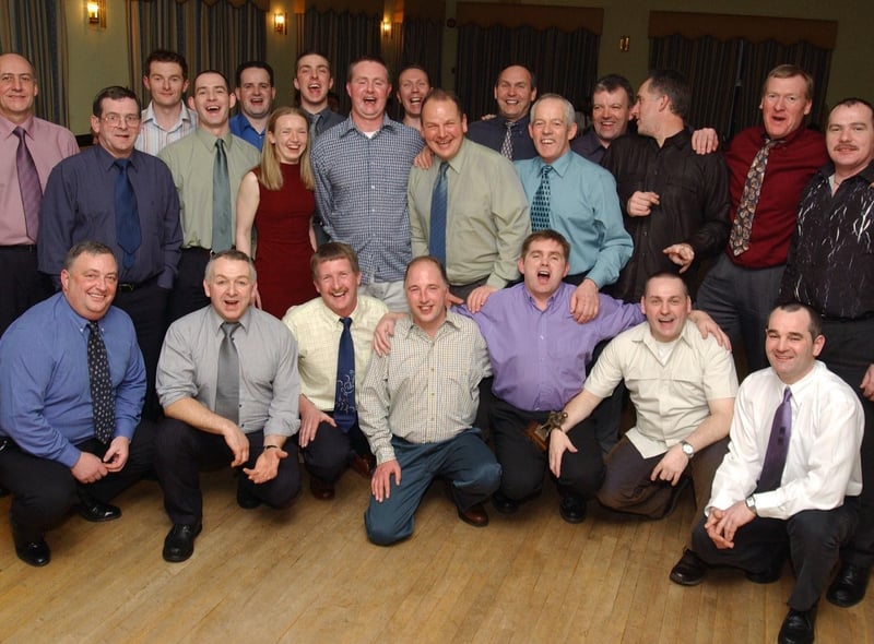 Paddy Ogilvie and Philip Devine with members of the White Watch from Northland Road fire station who came out to celebrate their friends and colleagues retirement party at the Broomhill hotel.                                 :Party snaps from 2003 by Hugh Gallagher