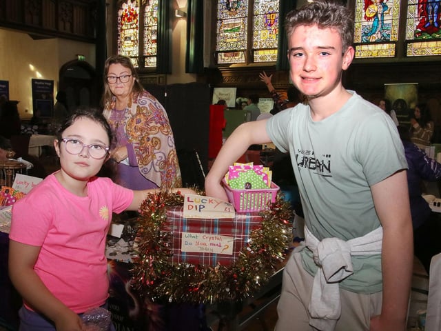 Lughna and Patrick at the Lucky Dip at the Maiden City Mystical Market held in the Guildhall. (Photo - Deirdre Heaney, nwpresspics)