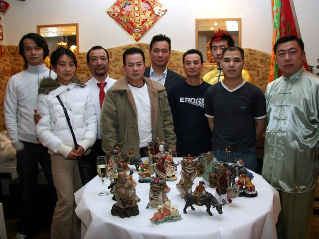Third from left, Alex Cheung, Chairman of SAI PAK, next to him Stan Lee, proprietor of The Mandarin Palace, also pictured, members of the local Chinese Community 0011JML