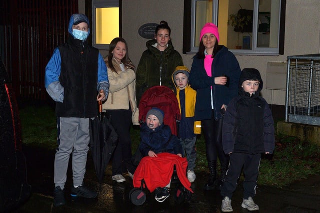 Families gather to greet Santa at the Creggan Community Collective, Cromore Gardens, on Friday evening last. DER2249GS – 32