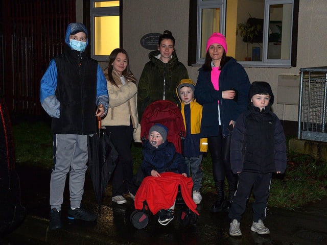 Families gather to greet Santa at the Creggan Community Collective, Cromore Gardens, on Friday evening last. DER2249GS – 32