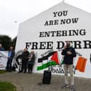 Palestinian photojournalist Motaz Azaiza speaking at Free Derry Wall on Thursday afternoon. Photo: George Sweeney