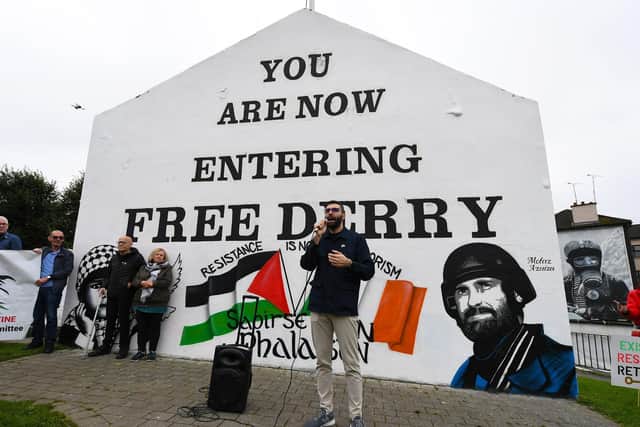 Palestinian photojournalist Motaz Azaiza speaking at Free Derry Wall on Thursday afternoon. Photo: George Sweeney