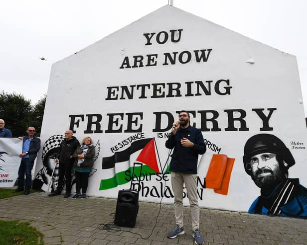 Palestinian photojournalist Motaz Azaiza speaking at Free Derry Wall on Thursday afternoon. Photo: George Sweeney