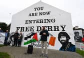 Palestinian photojournalist Motaz Azaiza speaking at Free Derry Wall on Thursday afternoon. Photo: George Sweeney