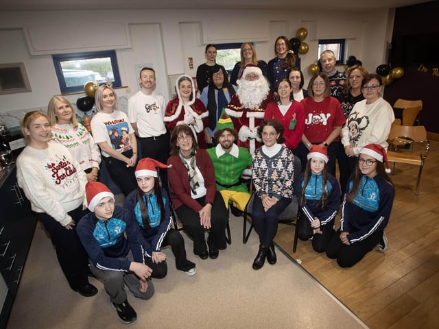 Derry Credit Union retirees Joan Gallagher, CEO and Mary Crumley, Education and Training Officer pictured on Santa Saturday with members of staff and volunteers. (Photos: Jim McCafferty Photography) : .