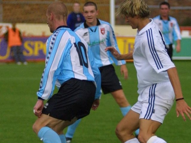Jamie Hughes is put under pressure during Derry City's friendly with Real Madrid.