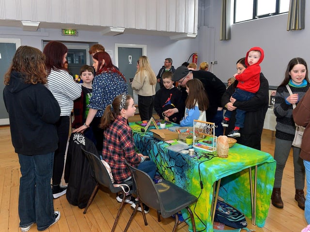 Browsing the stalls at the Spring Craft Fair held in St Mary’s Hall Muff on Sunday last. Photo: George Sweeney. DER2310GS – 008
