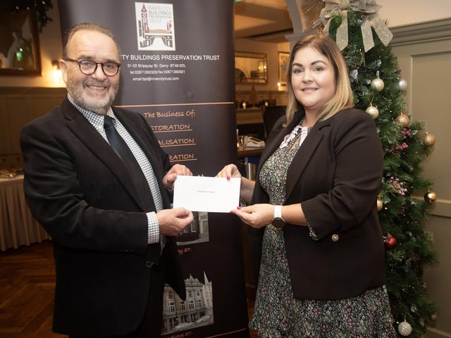 John Meehan, Inner City Trust, pictured handing over a cheque to Laura Brown, Churches Trust, at the Bishop's Gate Hotel, Derry on Thursday afternoon last. The event was part of the Inner City Trust's Annual Charity Giving. (Photos: Jim McCafferty Photography)