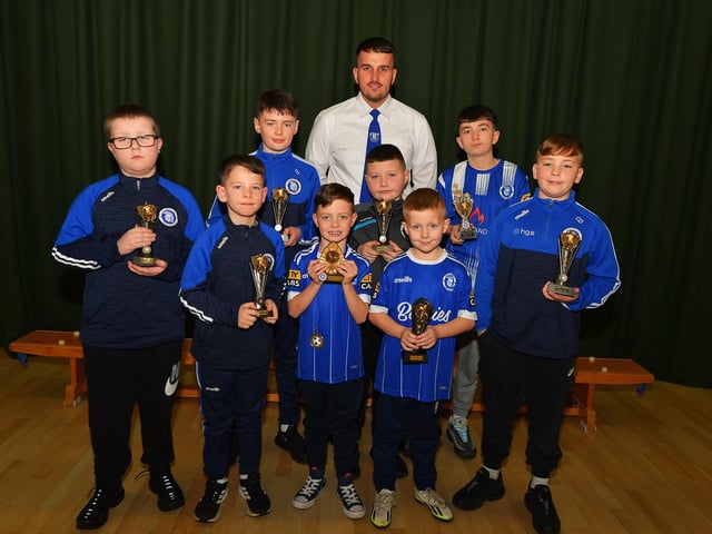 Vice-chairperson Diolain Ward pictured with 'Player of the Year' award winners at the Trojans FC annual Youth Presentation held in St Cecilia’s College. Photo: George Sweeney
