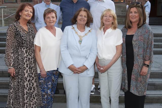The Mayor, Patricia Logue pictured with some of the family of the late Councillor, Pat Devine during Wednesday’s reception in his memory at the Guildhall. Front from left are Katrina, Liz, Sheena and Freda. At back are Eddie, Frankie and Anthony. Missing from photo are Paddy and Pauline.
