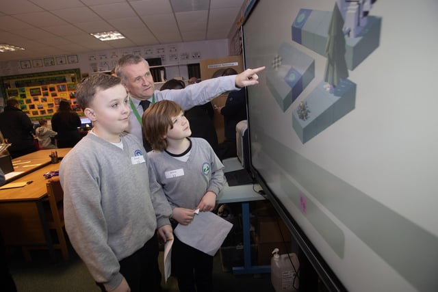 IT teacher Mr. Gerry McBride instructing Sacred Heart PS pupils Diarmuid Cox and Mason Monaghan on Rodo Codo on the whitescreen during Friday's Open Day. (Photos: Jim McCafferty Photography)