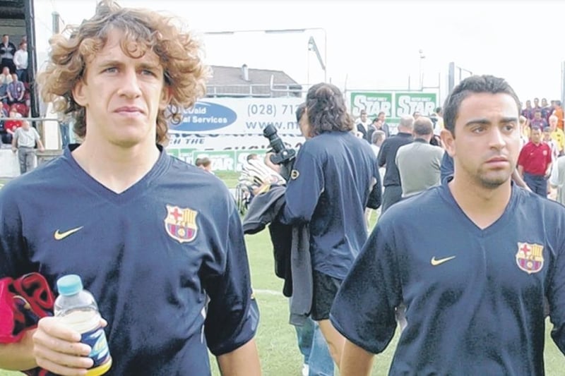 Carlos Puyol and Xavi Hernández