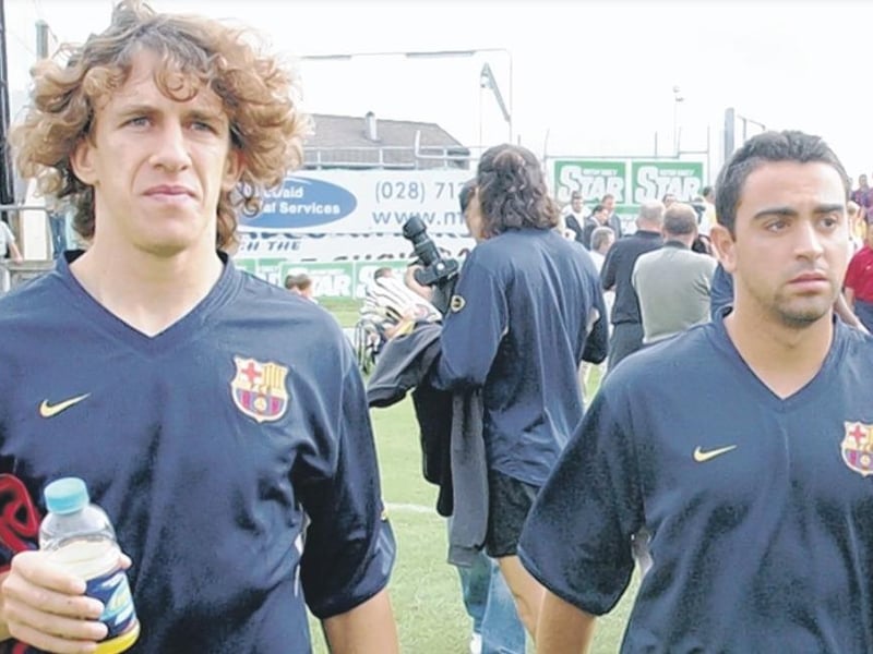 Carlos Puyol and Xavi Hernández