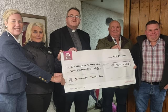 The Inishowen Truck Run raised funds for two local charities Donegal Hospice and Creeslough Tragedy Fund. A cheque for €7000 was presented recently to Father John Joe Duffy. Pictured L to R: Caroline Gurney, Jacqueline Duffy, Fr John Joe, Kevin O'Connor and Mickey Highboy