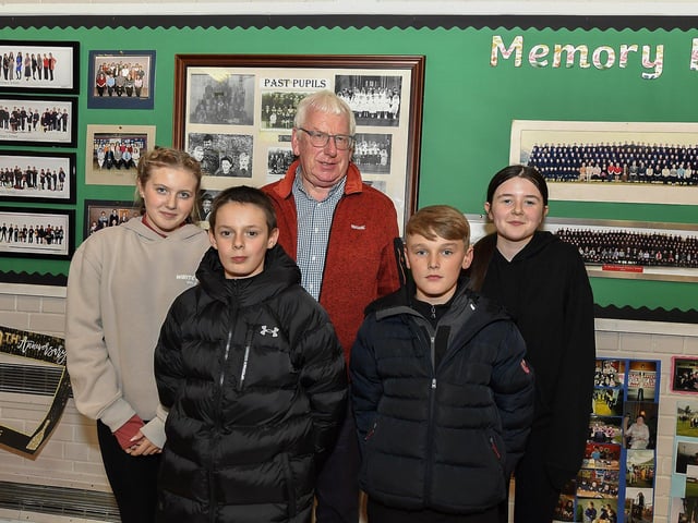 Former pupils Olivia, Clara, Kody and Josh pictured with former principal Brian McLaughlin at St Oliver Plunkett’s Primary School’s 50th anniversary celebrations on Thursday evening.