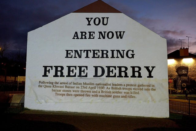 One of the projected images, on Free Derry Corner on Thursday evening, of the British colonial past from the 'The Sun Never Set And The Blood Never Dries' art project created by Art Everywhere.  The event was part of Bloody Sunday 51 anniversary. Photo: George Sweeney. DER2305GS 116