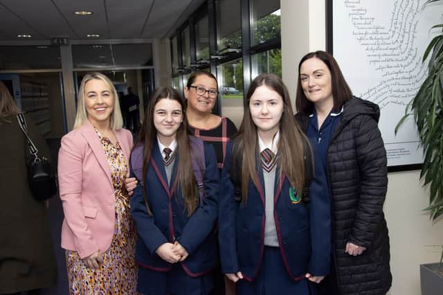Oakgrove Integrated College's new Vice Principal Kellie-Marie Martin, on left, welcoming some of the new starts and their mums to the school on Friday morning.