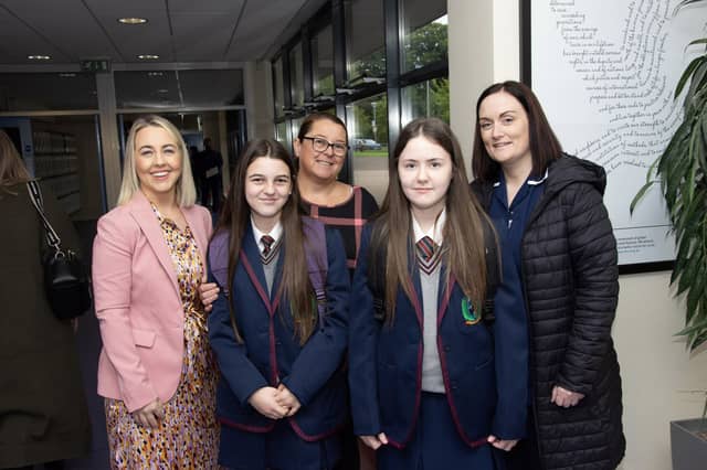 Oakgrove Integrated College's new Vice Principal Kellie-Marie Martin, on left, welcoming some of the new starts and their mums to the school on Friday morning.