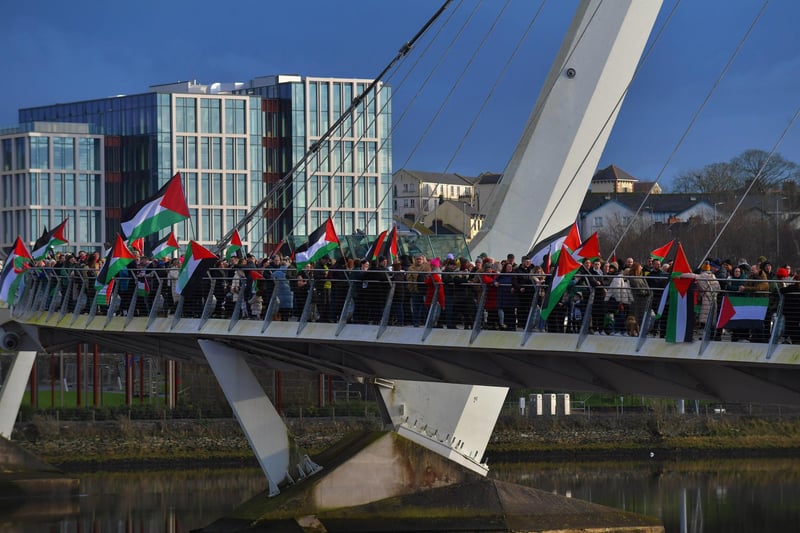 Hundreds of people gather on Derry’s Peace Bridge, on Sunday afternoon, in solidarity with Gaza and Palestinians. Photo: George Sweeney.