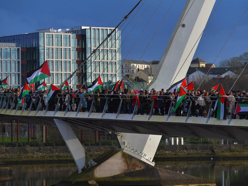 Hundreds of people gather on Derry’s Peace Bridge, on Sunday afternoon, in solidarity with Gaza and Palestinians. Photo: George Sweeney.