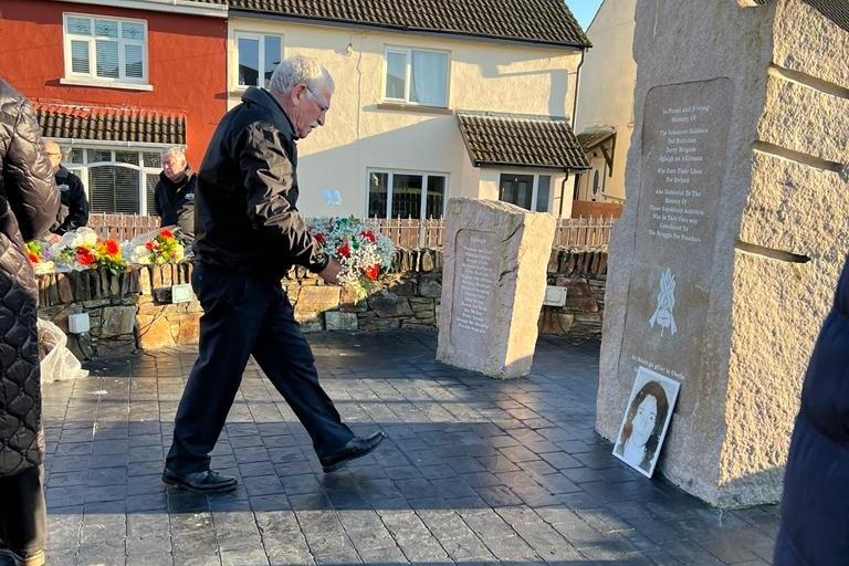 A wreath being laid in memory of Joe Walker at the Republican Monument in Central Drive.