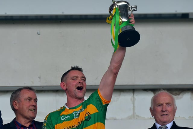 Glenullin captain Brian Mullan lifts the Derry Intermediate Football Championship trophy after their win over Drumsurn in Celtic Park on Sunday afternoon last. Photo: George Sweeney.  DER2243GS – 022