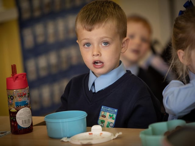 P1 pupil Freddie giving Mrs. Harkin his full attention during lessons at Hollybush PS last week. (Photos: Jim McCafferty Photography)