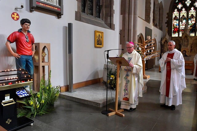 The Most Reverend Dr Donal McKeown, Bishop of Derry, and Fr Paul Farren, administrator, pictured at the blessing of the Blessed Carlos Acutis statue, during Mass on Wednesday morning, as part of the St Eugene’s Cathedral‘s 150 anniversary celebrations. Carlos died in 2006, age 15, from leukaemia. He was a frequent communicant and had been cataloguing reported Eucharistic miracles from around the world before his death.  Photo: George Sweeney.  DER2318GS – 44