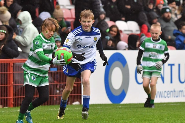 Young footballers from Faughanvale and Ballinderry playing during the SFC final interval at Celtic Park on Sunday afternoon. Photo: George Sweeney