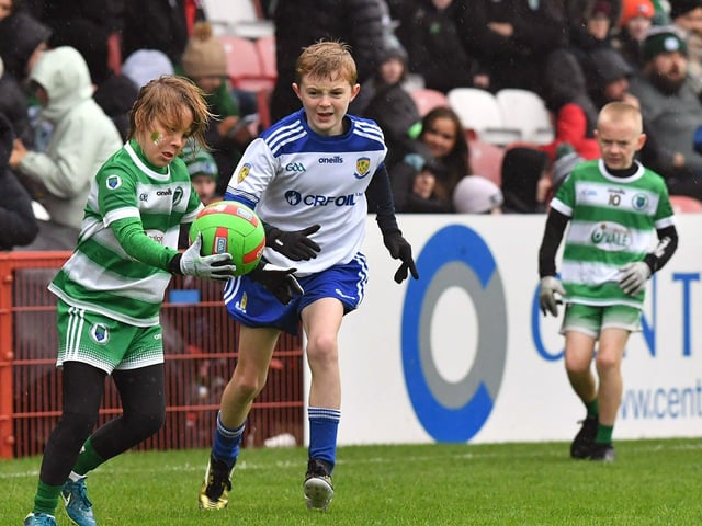 Young footballers from Faughanvale and Ballinderry playing during the SFC final interval at Celtic Park on Sunday afternoon. Photo: George Sweeney
