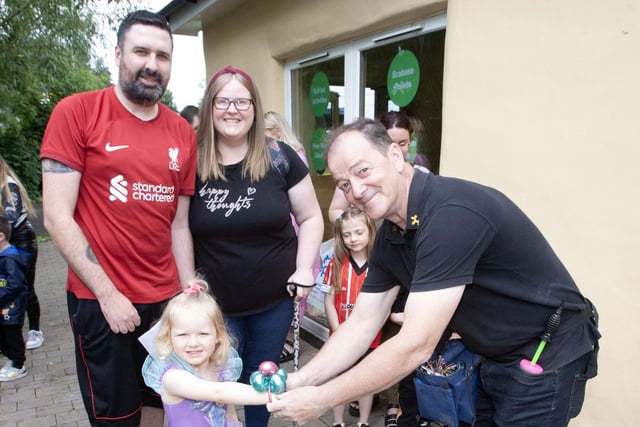 Balloon jewellery for young Ava O'Donnell at Friday's GSAP/Ethos Fun Day. Included are her parents Anthony and Lynn. (Photos: JIm McCafferty Photography)
