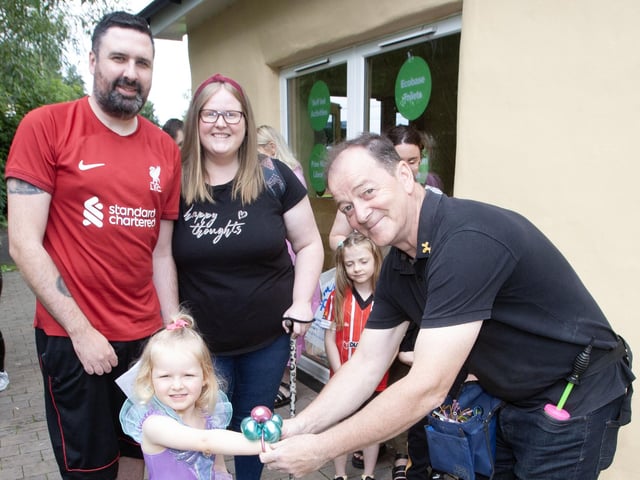 Balloon jewellery for young Ava O'Donnell at Friday's GSAP/Ethos Fun Day. Included are her parents Anthony and Lynn. (Photos: JIm McCafferty Photography)