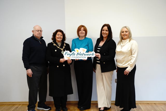 Mayor Patricia Logue with staff and volunteers at the Foyle Foodbank AGM on Monday when the organisation rebranded as the Foyle Network Foundation.