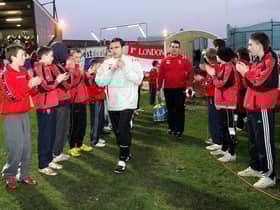 Derry City manager Pat Fenlon makes his way onto the pitch at the Brandywell for their Setanta Cup game against Linfield in 2007.