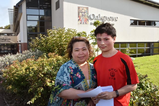 Adam Dennis celebrates his GCSE results with his mum Adriani at Oakgrove College.