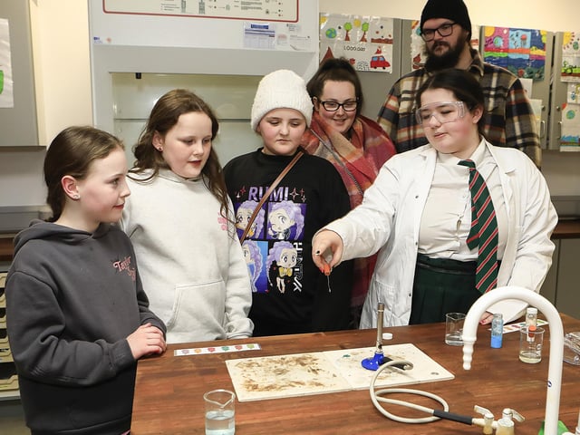 Student Teagan Murray with P7 pupils and parents in the Science Department at St. Cecilia’s College Open Night. (Photo - Tom Heaney, nwpresspics)