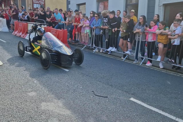 Members of the public watch the Soapbox Derby in Carndonagh.