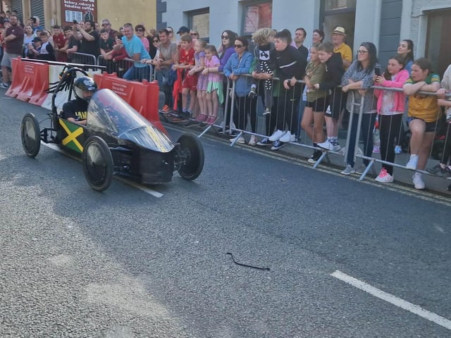 Members of the public watch the Soapbox Derby in Carndonagh.