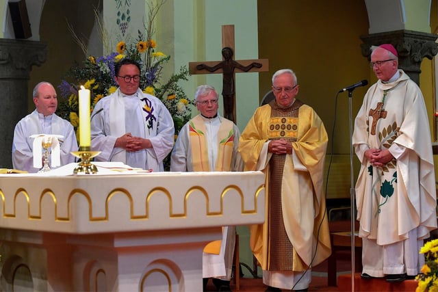 The Bishop of Derry, the Most Reverend Dr Donal McKeown and visiting priest pictured with Fr Con McLaughlin at a Mass to celebrate Fr McLaughlin’s Golden Jubilee in the priesthood, held at the Church of the Sacred Heart, Carndonagh, on Saturday evening. Photo: George Sweeney. DER2323GS – 160