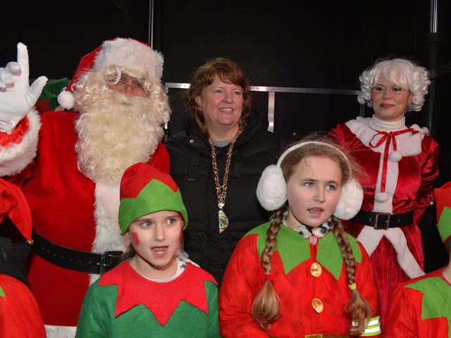 The Deputy Mayor of Derry and Strabane, Alderman Niree McMorris pictured with children from Culmore Kids Club, Santa and Mrs Claus at the Culmore Community Hub on Friday night. Photo: George Sweeney