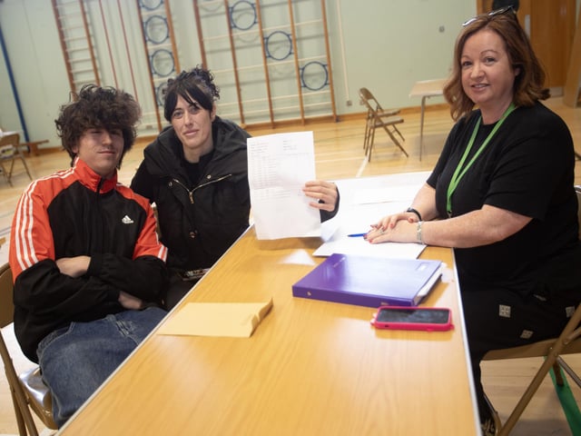 Mrs. Mary Jo Shiels, senior teacher, discussing options with a student after Thursday's GCSE results at St. Joseph's Boys School.