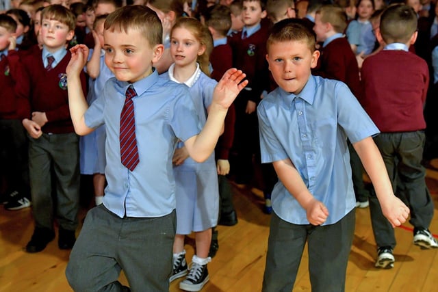 Pupils at St John’s Primary School jive during the Jive Aces performance on Thursday afternoon. Photo: George Sweeney.  DER2317GS – 24