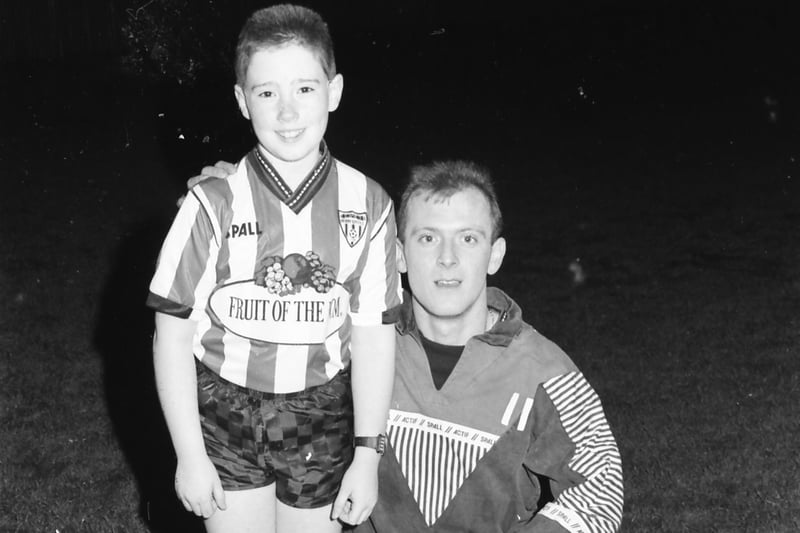 Derry City winger Gregory Kearney with the match mascot.
