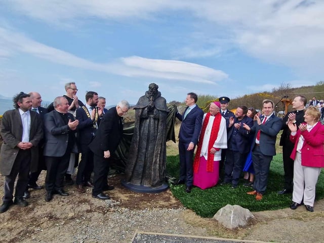 The  unveiling of a statue commemorating Friar Seamus Hegarty at Fr Hegarty's Rock on Friday.